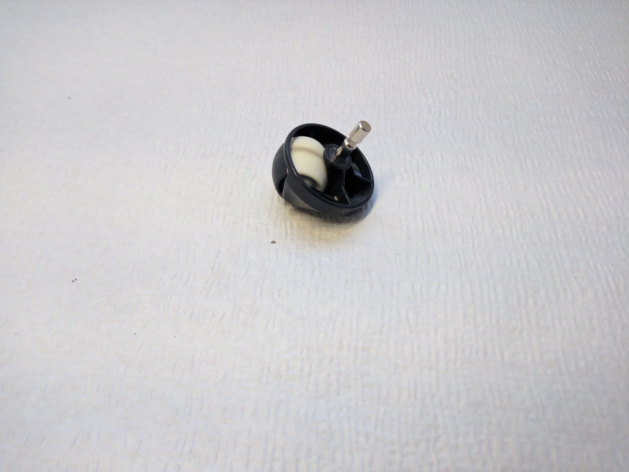 Roulette centrale pour aspirateur robot